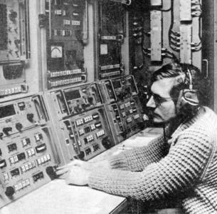 Gary Peach G7SLL operating radio equipment