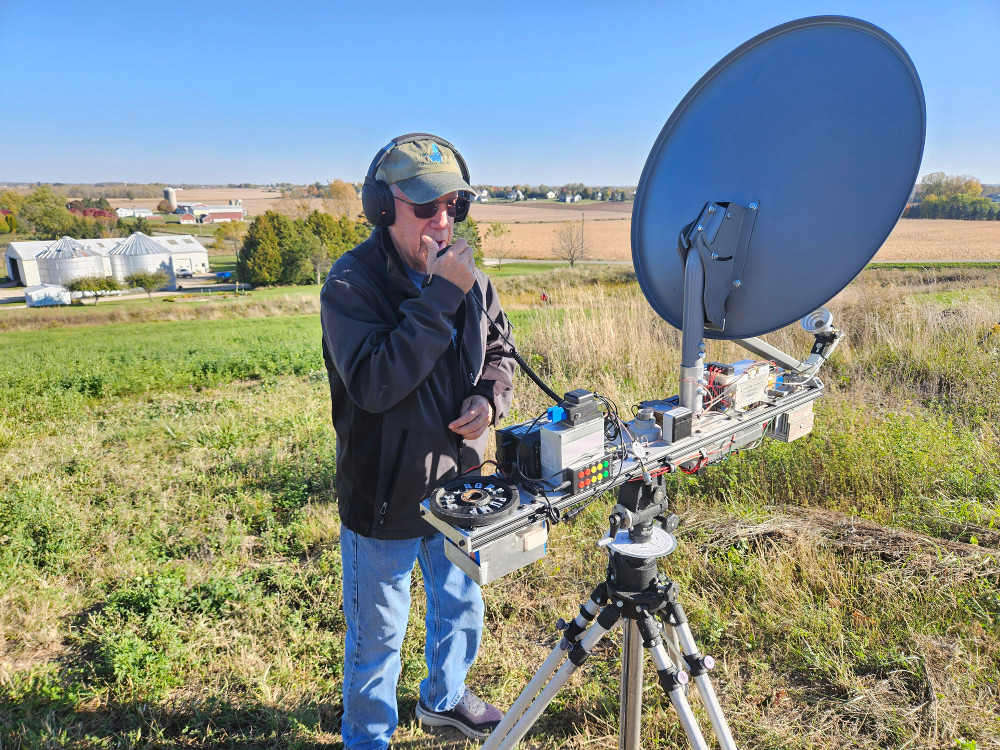 Microwave amateur radio operation with dish antenna at Larry WA9TT's station